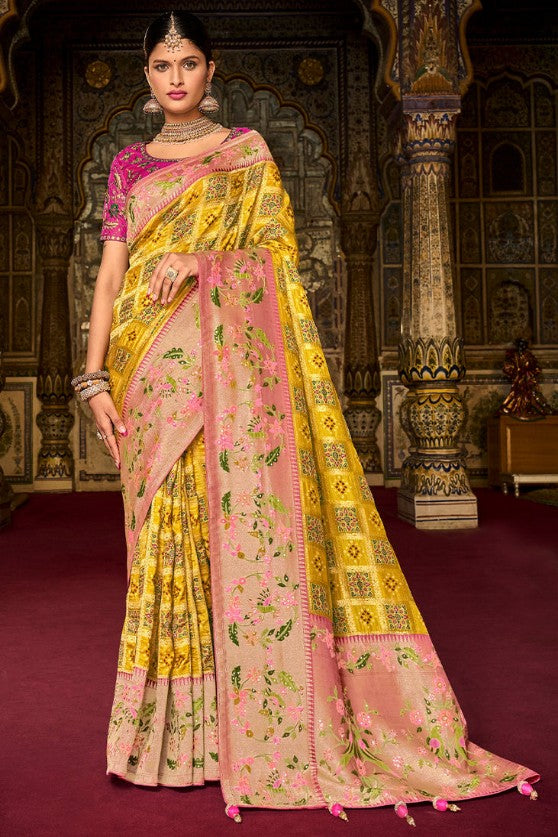 Cadmium Yellow Woven Patola Silk Saree With Heavy Embroidered Blouse