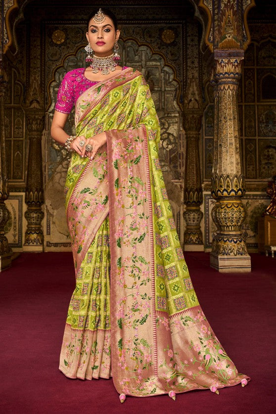 Chartreuse Green Woven Patola Silk Saree With Heavy Embroidered Blouse