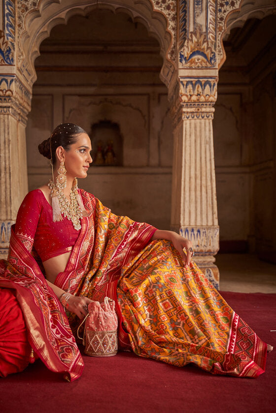 Mustard Yellow And Red Patola Silk Saree