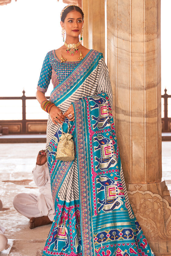 Splendid Blue Woven Patola Silk Saree With Heavy Border