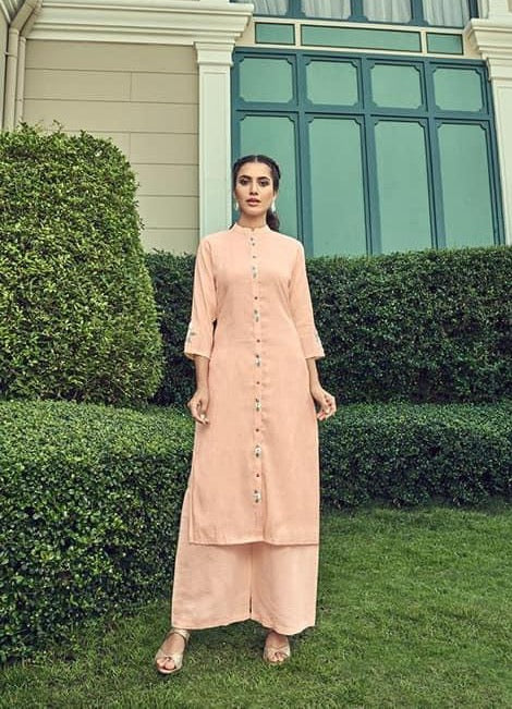 Exclusive light peach kurti palazoo for Festive look.