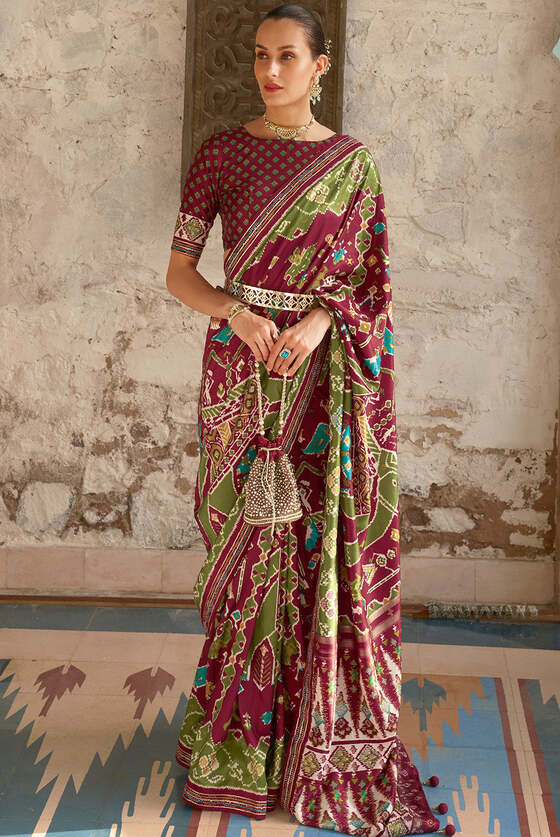 Brown & Green Printed Patola Silk Saree With Zari Border & Tassels On Pallu