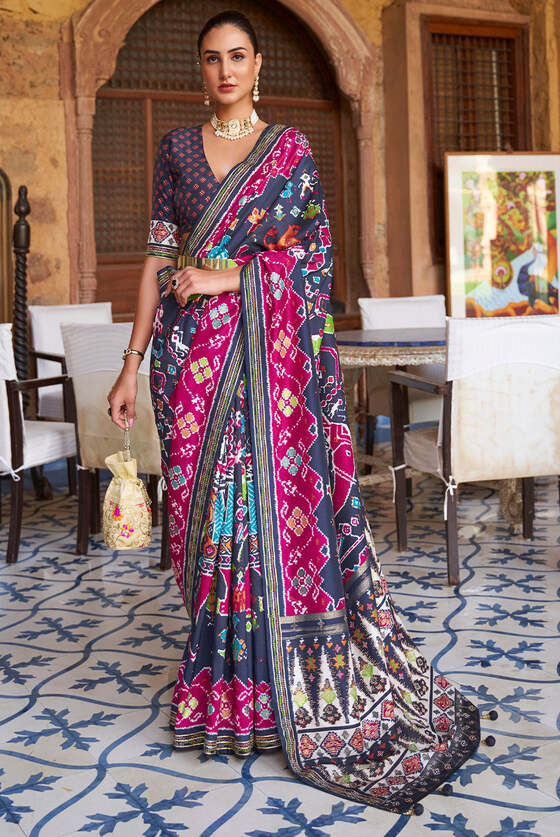 Blue & Pink Printed Patola Silk Saree With Zari Border & Tassels On Pallu