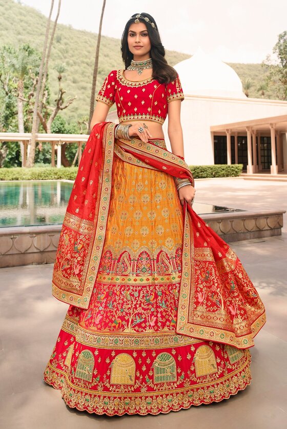 Divine Yellow And Red Hand Heavy Embroidered Banarasi Lehenga Choli