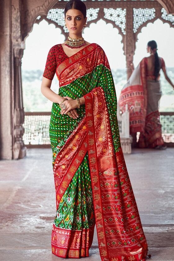 Kelly Green & Red Patola Silk Saree With Zari Border Pallu & Stone Work