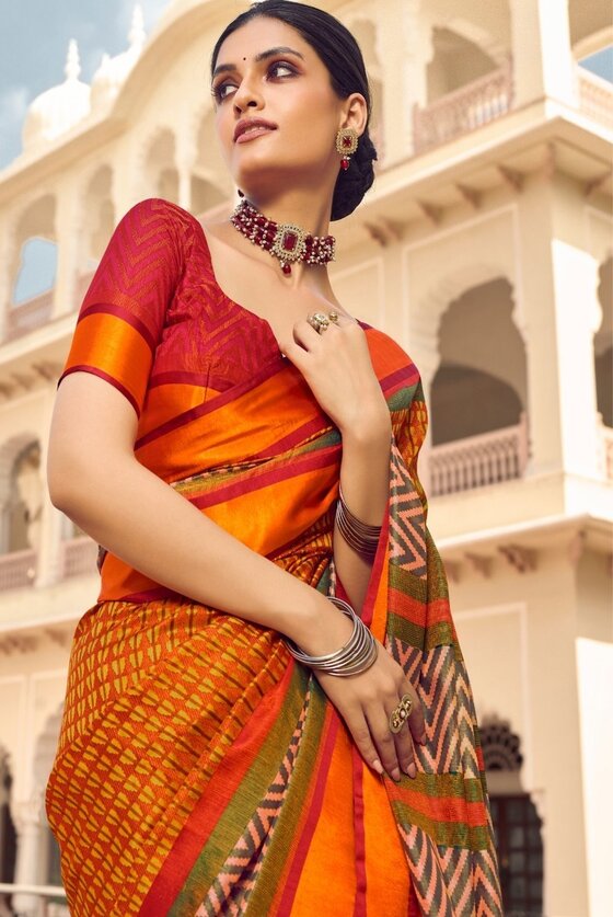 Carrot Orange Woven Patola Print Saree With Satin Border