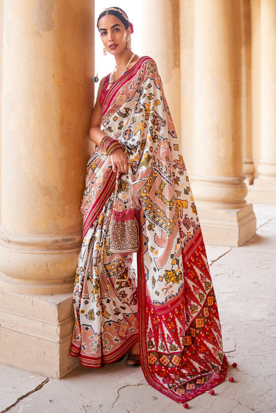 Classic Off White Patola Silk Saree With Handmade Tassels