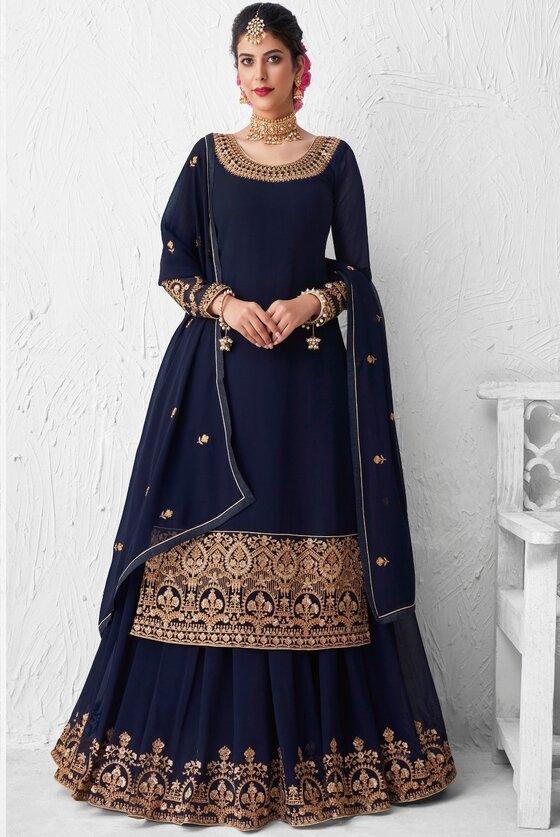 Denim Blue straight cut paired with an Embroidered Lehenga