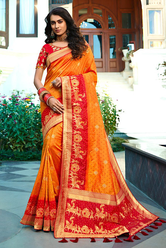 Saffron Orange Woven Silk Saree With Heavy Embroidery Blouse