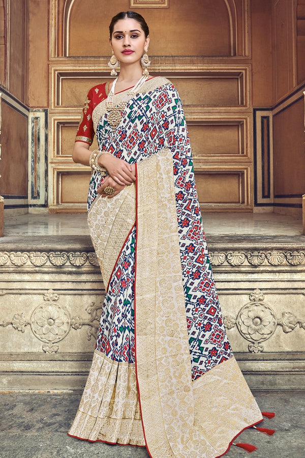 WHITE RED WOVEN PATOLA SAREE WITH BANARASI BORDER AND DESIGNER EMBROIDERED BLOUSE