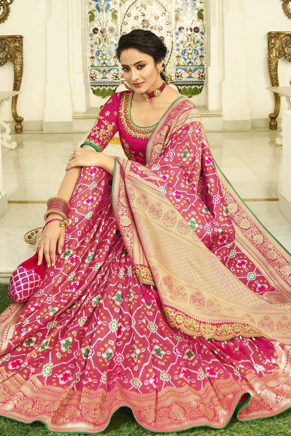 Pink designer banarasi Patola saree with embroidered silk blouse