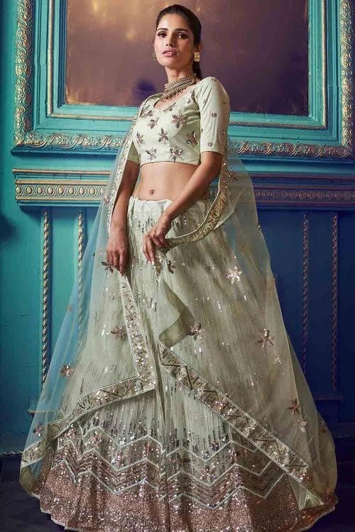 Pistachio Green Soft Net Heavy Work Lehenga Choli