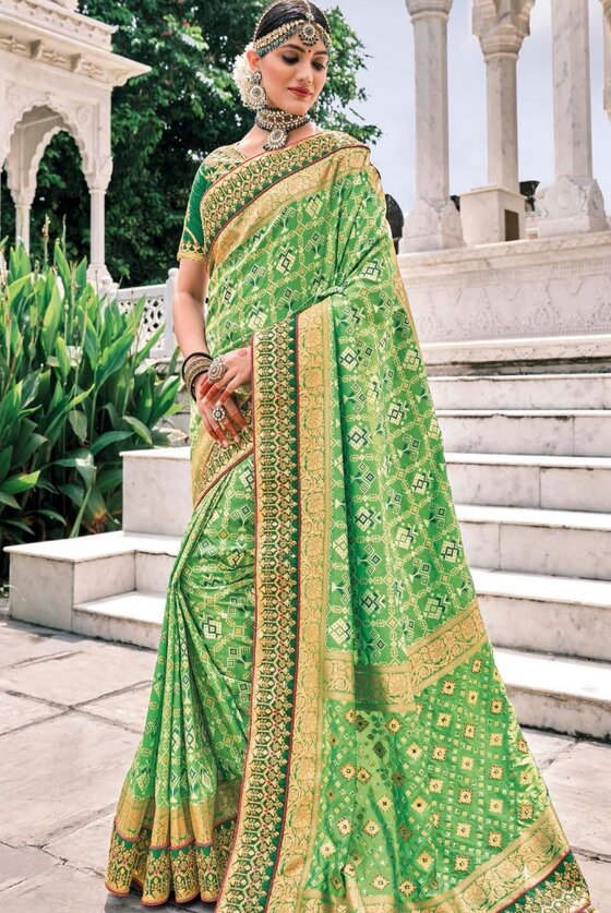 Screamin Green Patan Patola Silk Saree With Heavy Embroidered Blouse