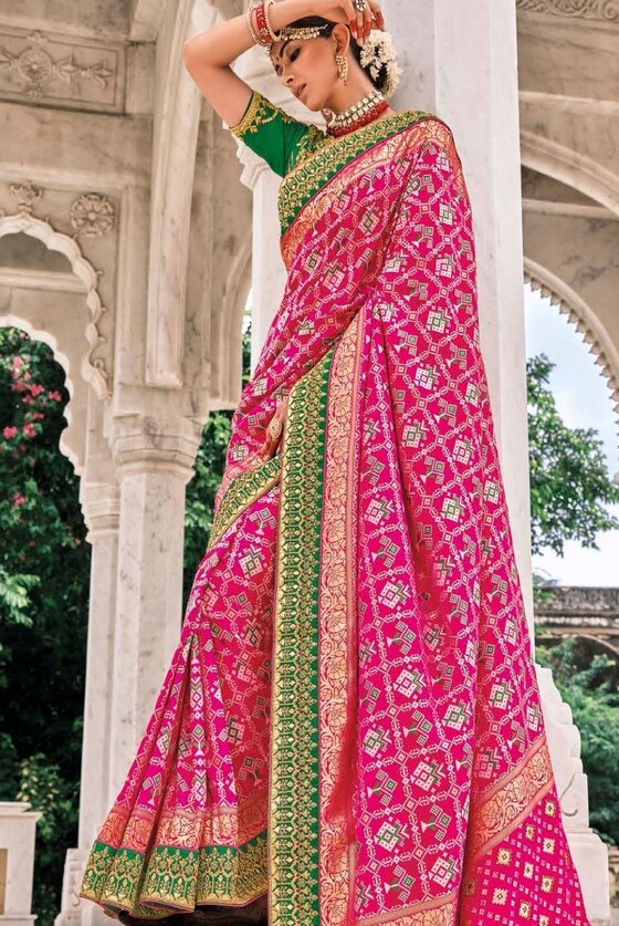 Fuscia Pink Patan Patola Silk Saree With Heavy Embroidered Blouse