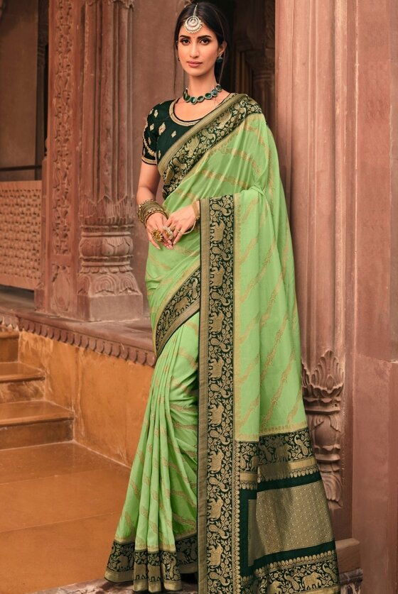 Pastel Green Woven Banarasi Silk Saree With Embroidered Blouse