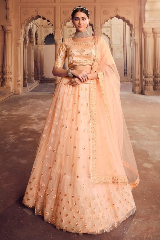 Peach Exclusive Heavy Net Designer Lehenga Choli