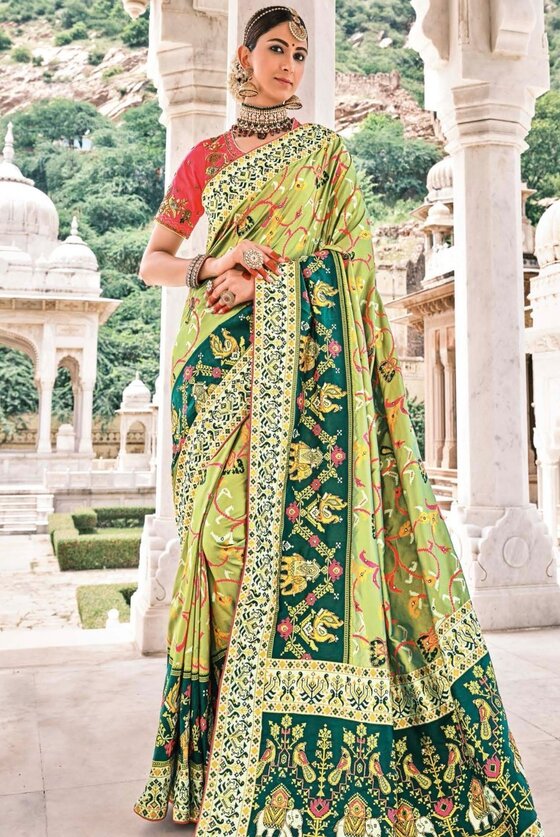 Slime Green Patan Patola Silk Saree With Heavy Embroidered Blouse