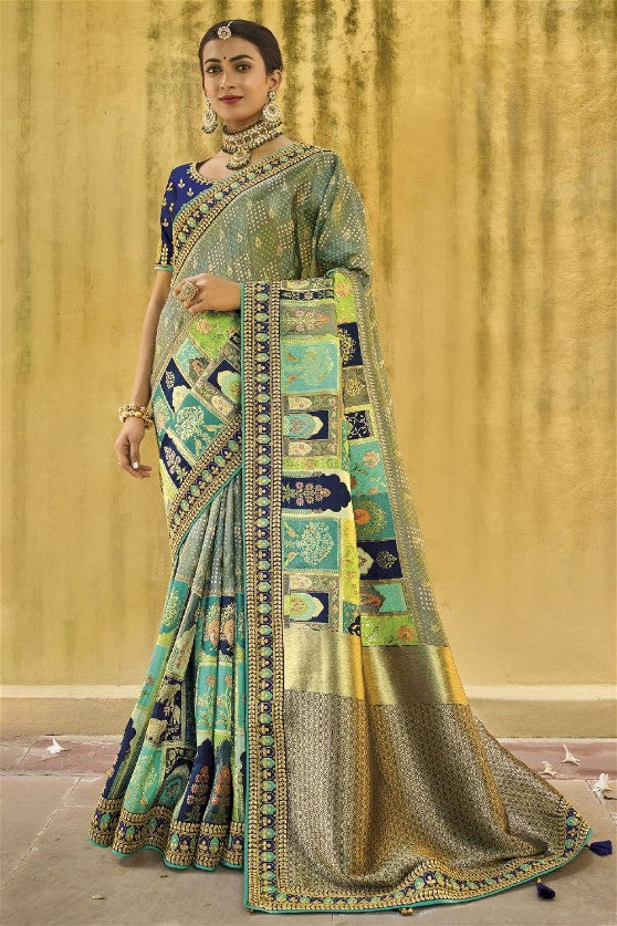 Viscose  Silk Traditional Woven Saree
With Embroidered Border And Blouse