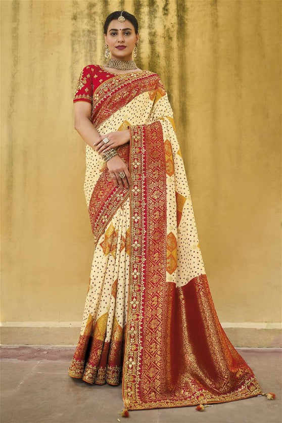 Cream Viscose Silk Elephant and Bird Motifs Saree
With Embroidered Border And Blouse