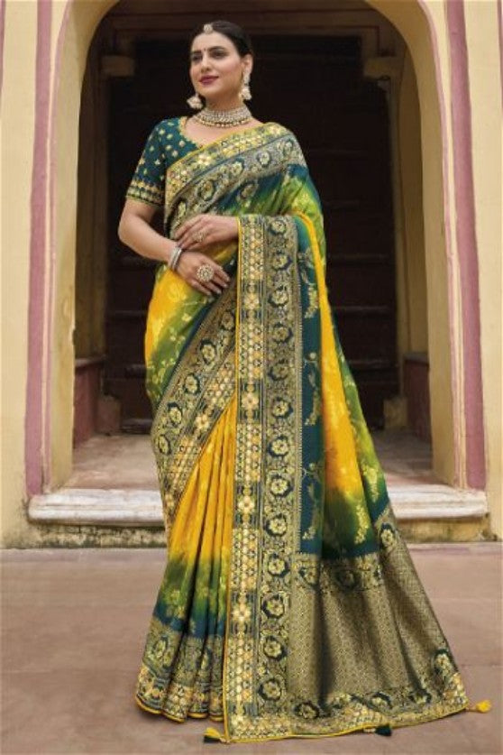 Yellow and Green colour Viscose Silk Saree

With Embroidered Border And Blouse