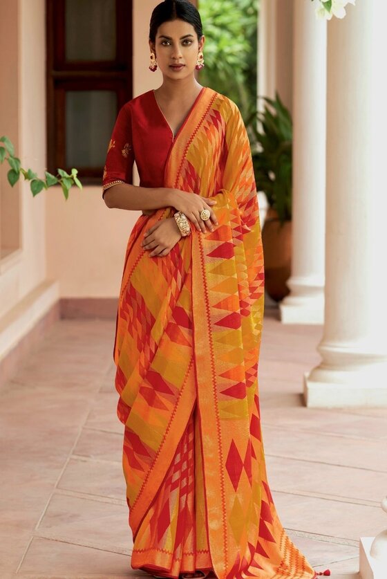 Red And Yellow Printed Patola Silk Saree With Embroidered Blouse