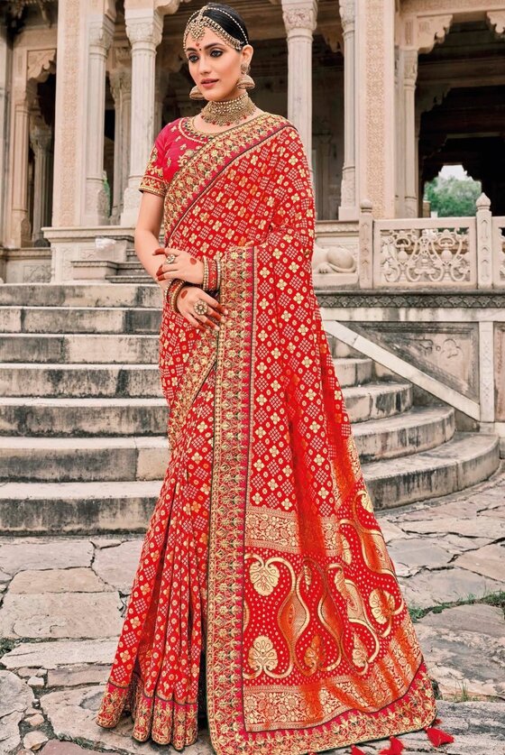 Rose Red Patan Patola Silk Saree With Heavy Embroidered Blouse