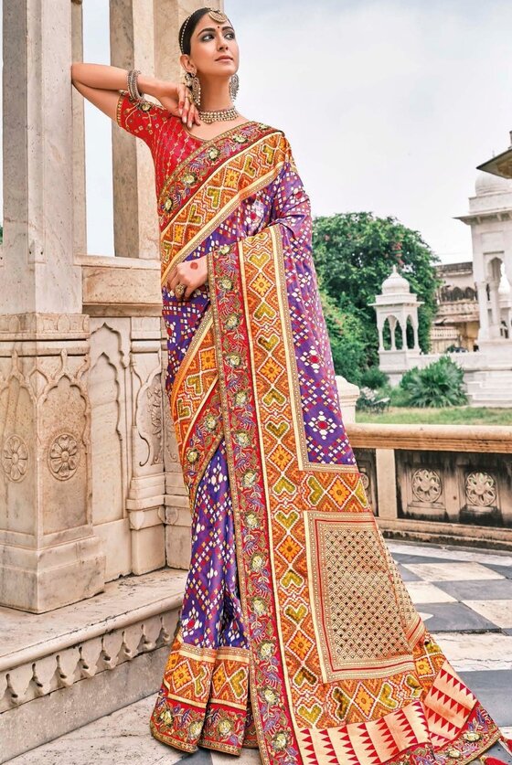 Electric Purple Patan Patola Silk Saree With Heavy Embroidered Blouse