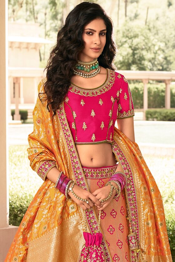 Bridal Gold And Pink Hand Heavy Embroidered Banarasi Lehenga Choli